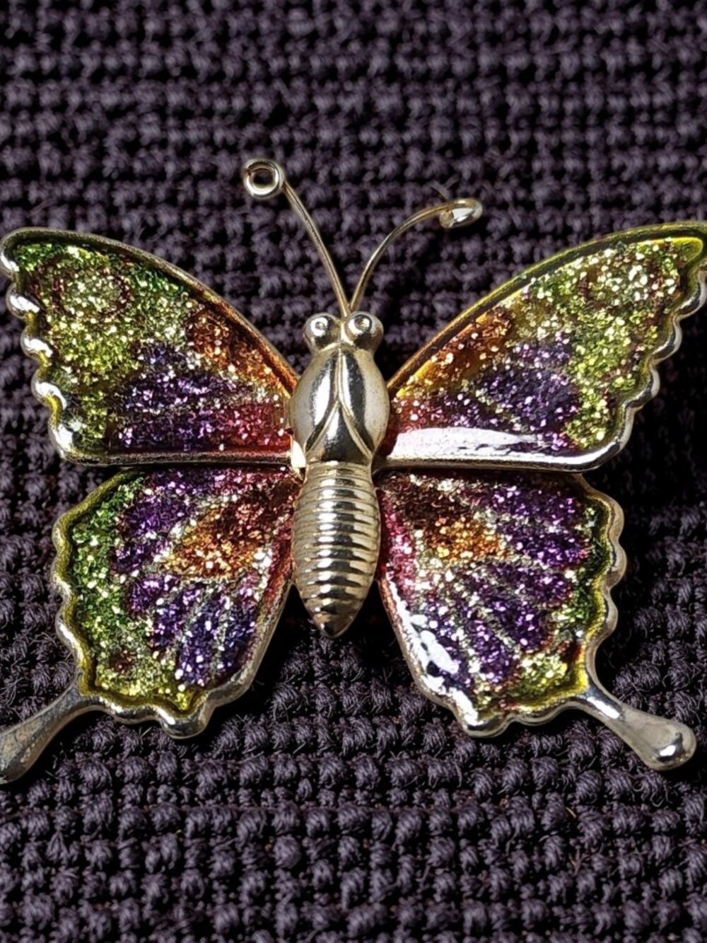 vintage gold tone butterfly brooch enameled in sparkling metallic purple, green,